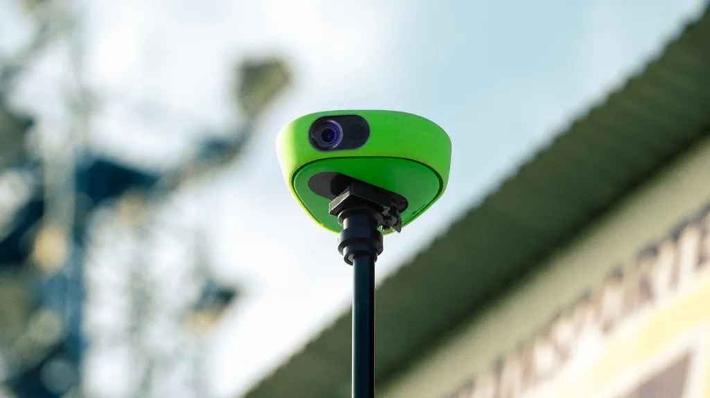 Veo Cam 3 mounted on a tripod at a stadium